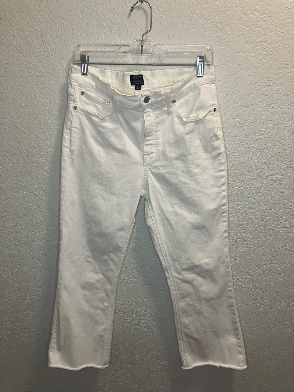 Mid Rise Flare Crop Jean with Raw Hem